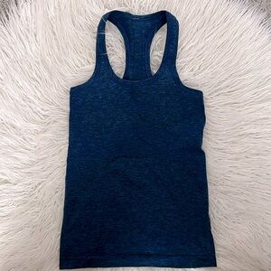 Blue heathered lululemon swiftly razorback tank, size 4